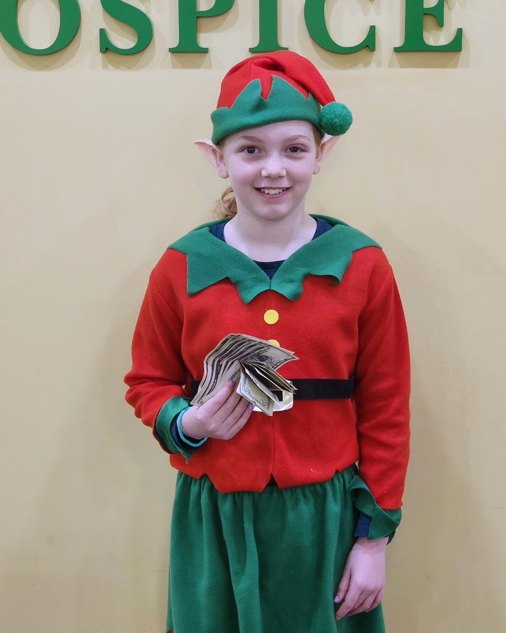Christmas elf helping with fundraising